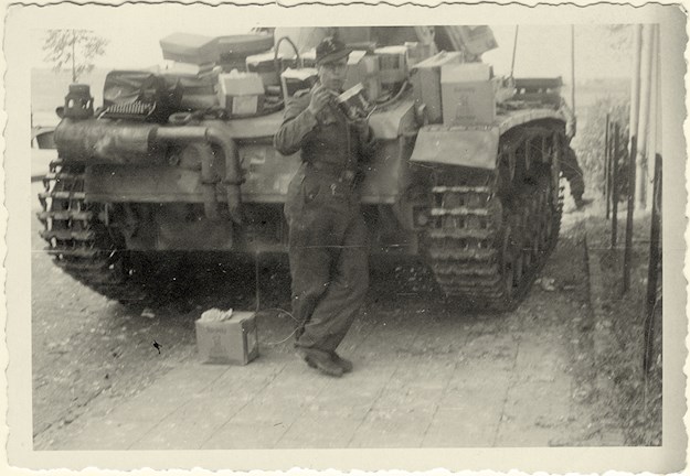 Kracht seen eating meal behind his tank which was parked on the driveway of the printing firm Jos Pé. © Bob Gerritsen and Scott Revell: Retake Arnhem Bridge