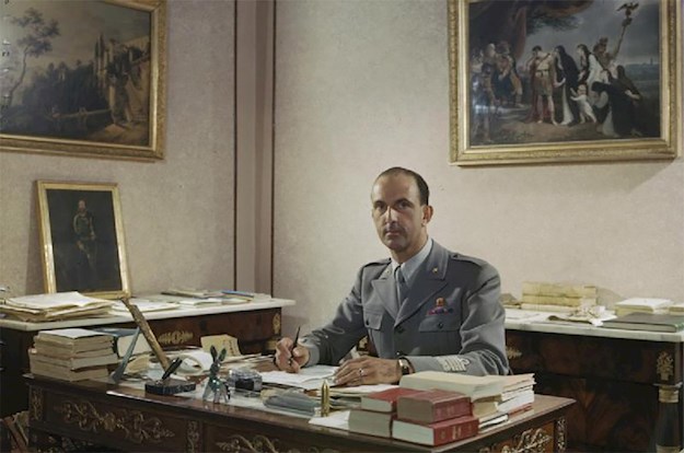 Prince Umberto at his desk in the Royal Palace of Naples, May 1944. © Public Domain