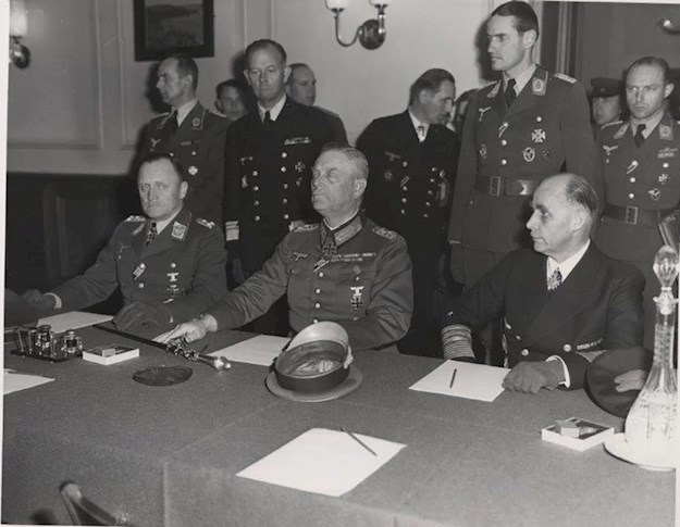 Field Marshal Wilhelm Keitel signs the unconditional surrender of the German army. Berlin, 9 May 1945. © AlliiertenMuseum/Coleman/U.S. Signal Corps