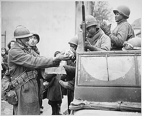 French and U.S. Soldiers shake hands near the end of the battle, Rouffach, 5th February 1945